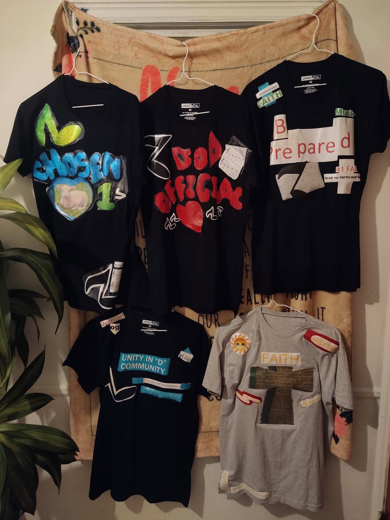 Rack of hand made faith tees